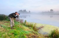 Fotograaf Jeroen bij zonsopkomst in de Polder Berkenwoude